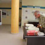 Professor Steve Mithen looking at museum items ready for display