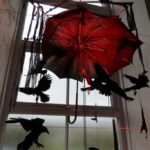 Red light lights the crows of Borth