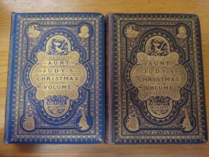 Photograph of two volumes of Mrs Gatty "Aunt Judy's Christmas Volume"