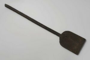 A wooden spade