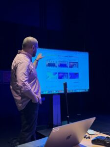 A presenter gives an on-screen presentation