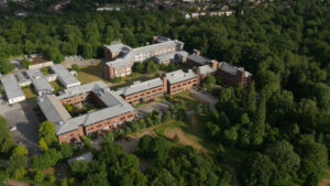 birds-eye view of the Earley Gate buildings at the University of Reading, with trees surrounding