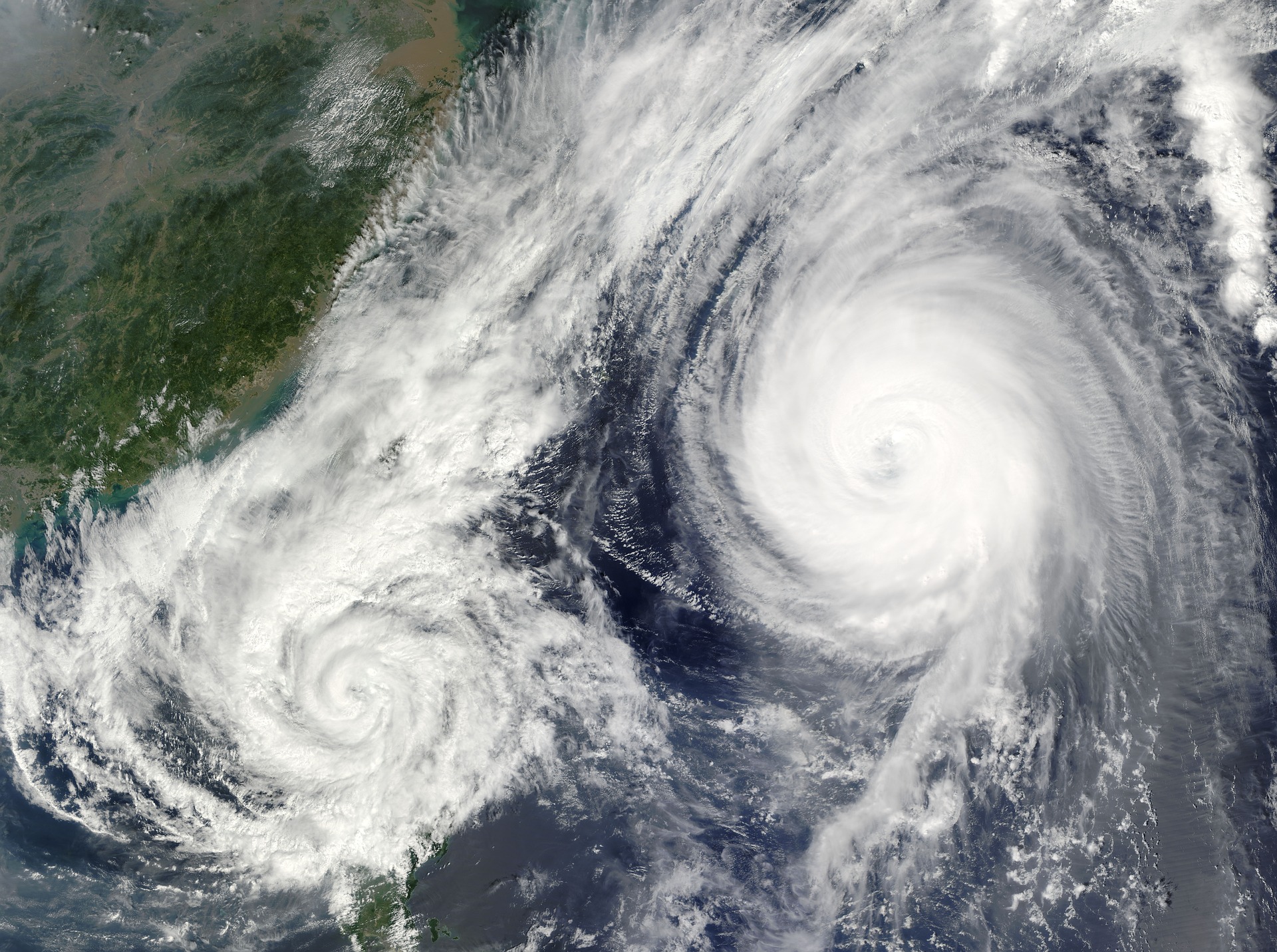Satellite image of Typhoon Parma (left) and Melor (right) interacting with each other in the Philippine Sea.