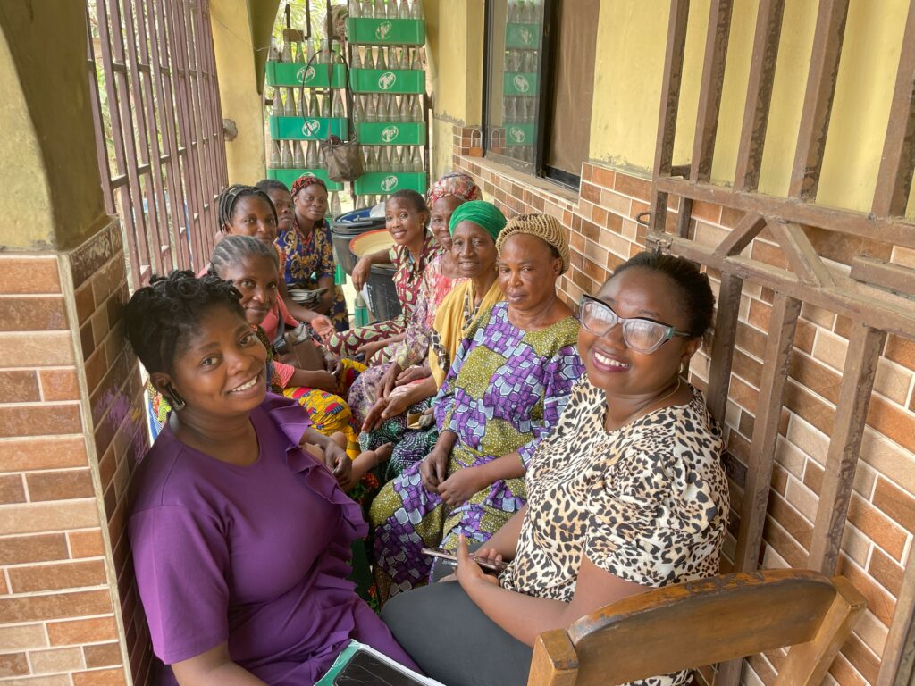 Abiola interacting with women