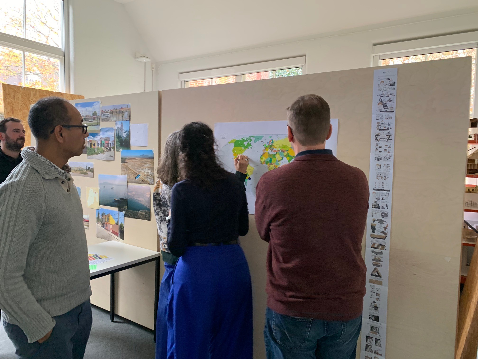 Workshop participants mapping their research and showing cumulative knowledge