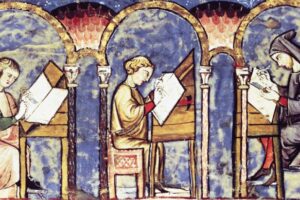 An illumination depicting a scriptorium in action showing two people writing at individual desks facing a nun also writing at a desk who is facing the other two people