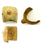 Incomplete medieval gauntlet knuckle guard. Full description at https://finds.org.uk/database/artefacts/record/id/152714