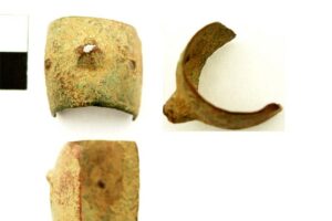 Incomplete medieval gauntlet knuckle guard. Full description at https://finds.org.uk/database/artefacts/record/id/152714