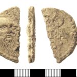 Post-Medieval cast lead or lead-alloy papal bulla of Pope Leo X (AD 1513-1521). Full description at https://finds.org.uk/database/artefacts/record/id/522639