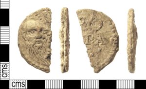 Post-Medieval cast lead or lead-alloy papal bulla of Pope Leo X (AD 1513-1521). Full description at https://finds.org.uk/database/artefacts/record/id/522639