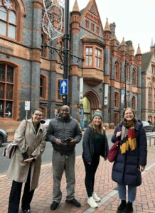 Four members of the Nation of Refuge team outside Reading Museum