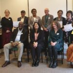 Community Participatory Action Researchers and partners at a showcase event in April 2022.