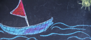 Chalkboard drawing of a boat transporting migrants across the sea