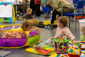 Child playing with toys at a playgroup