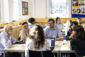People sitting at a table talking