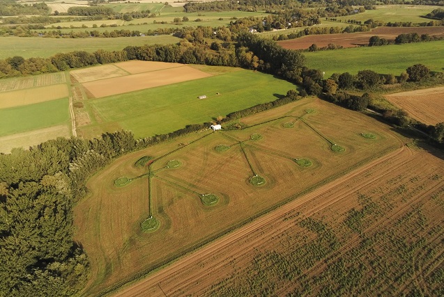 Aerial dron colour photograph of experimental field site showing rings dug into filed to measure pollution