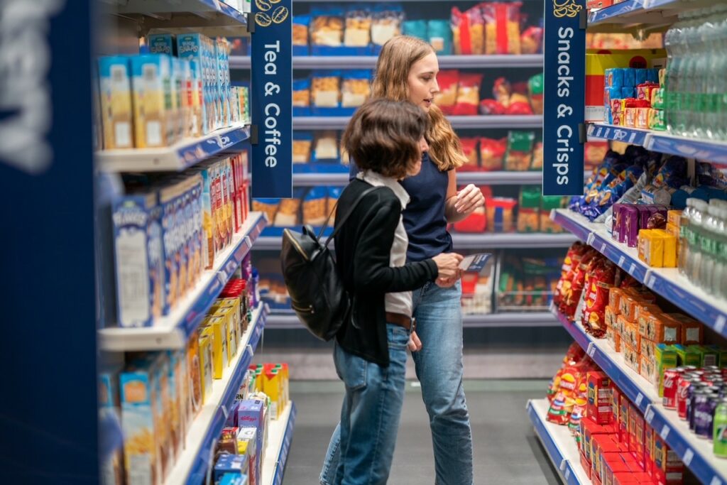 Shoppers in a supermarket aisle – an immersive supermarket experience created at UCL’s Person Environment Activity Research Lab (PEARL).