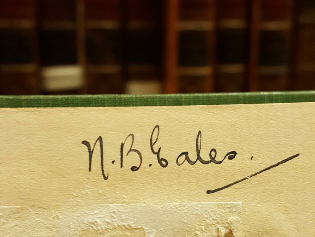 Eales's signature, written in ink inside the cover of one of her books.