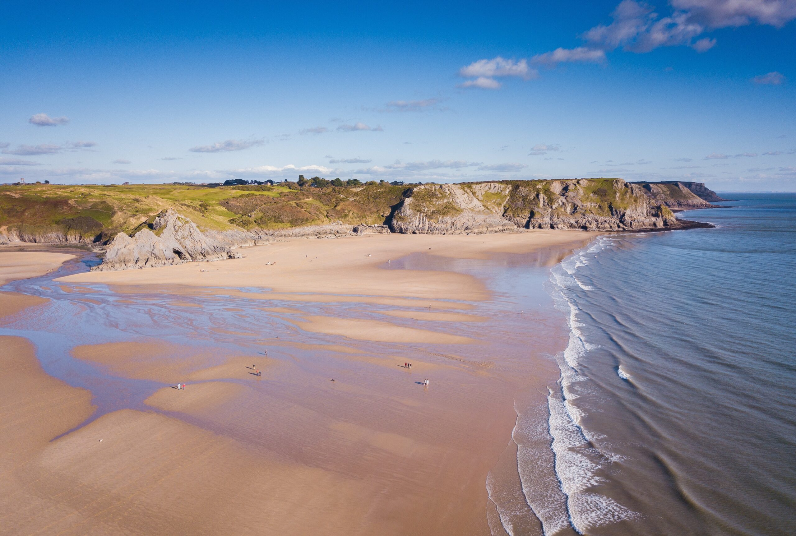 Three Cliffs Bay at the Gower Peninsula during a sunny day