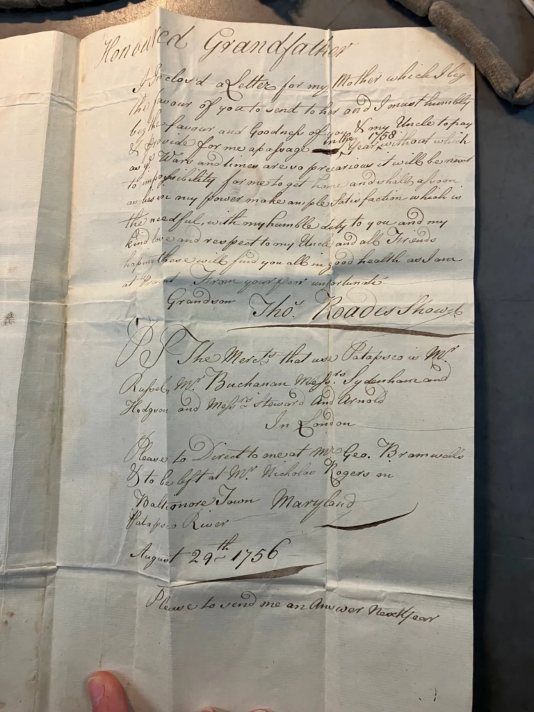 A letter written in Maryland by convict, Thomas Rhoades Showle, home to his grandfather in England begging for help to return from America, dated August 29th, 1756, photographed by Alexandra Cox.