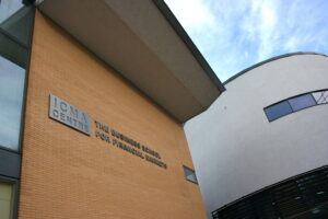 Exterior of ICMA building against a blue sky