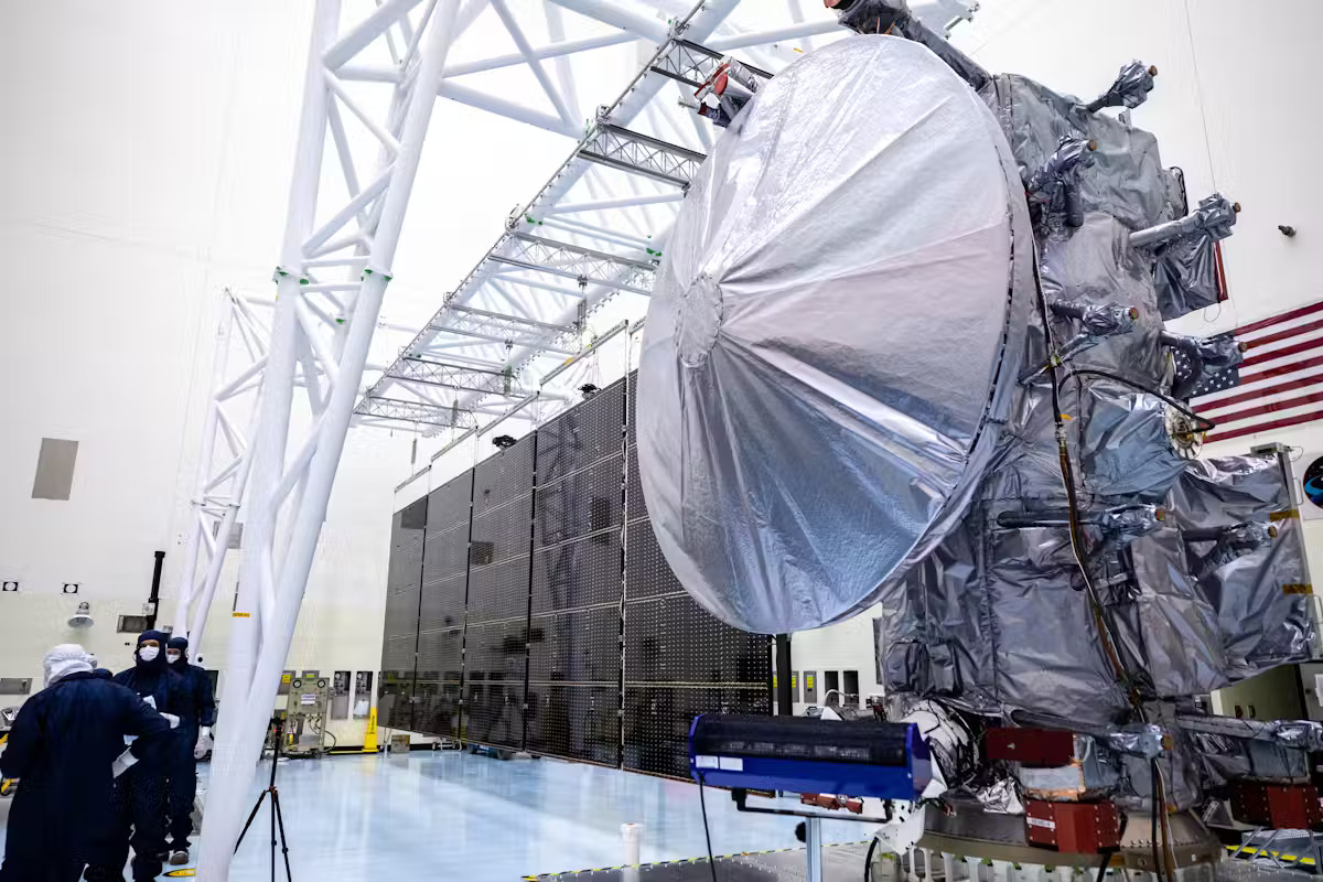 A satellite being assembled in a sterile environment