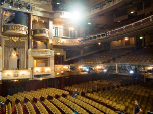 An empty yet illuminated theatre auditorium