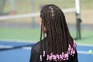rear-shot-of-girl-with-braids