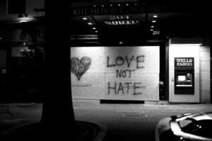 love-not-hate-graffiti-on-wooden-board