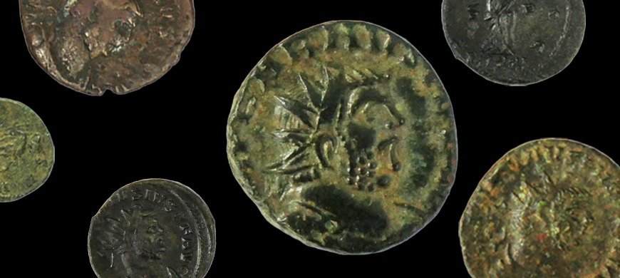 Roman coins against black background