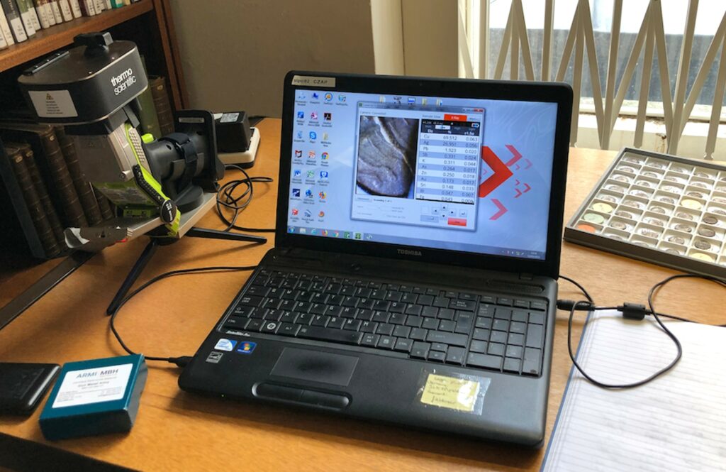 Laptop analysing Roman coins