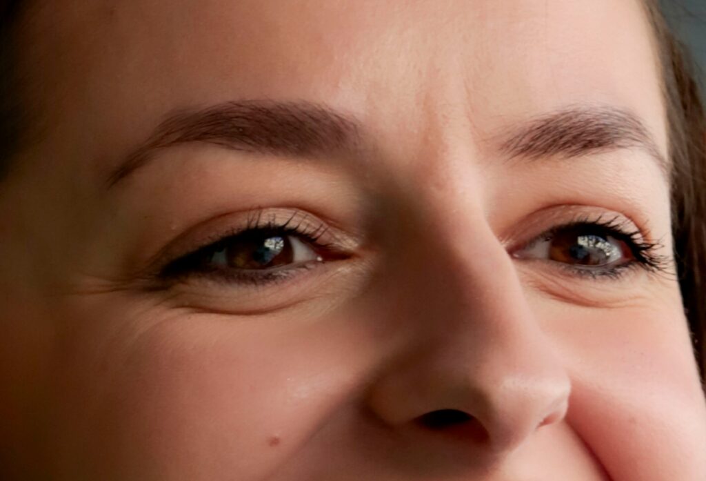 eyes and nose of smiling woman