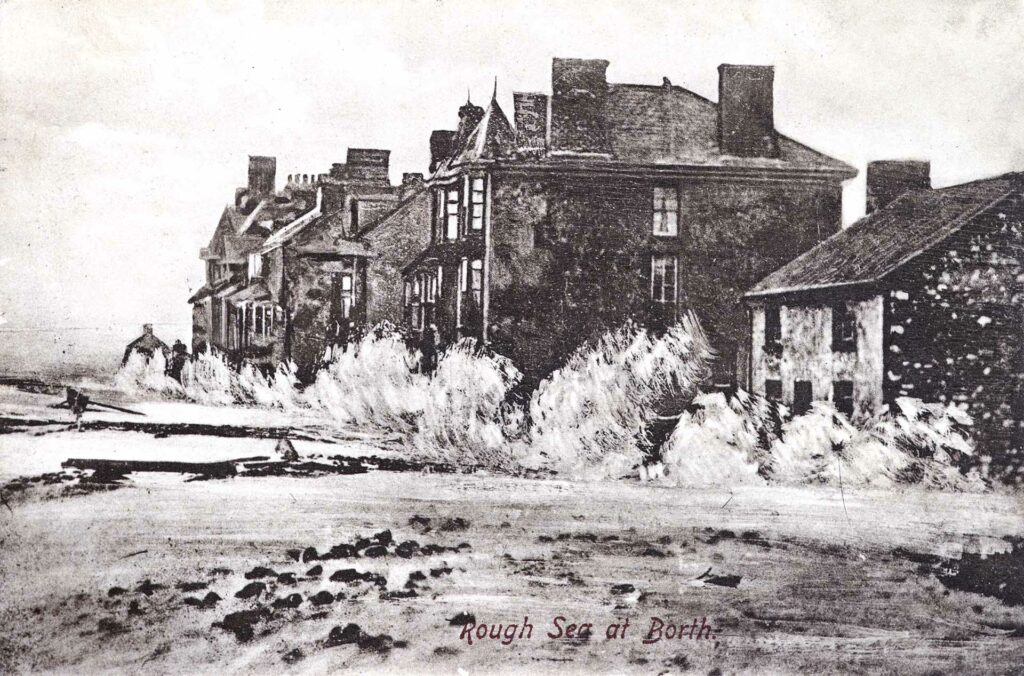 Black and white drawing showing rough sea crashing against houses