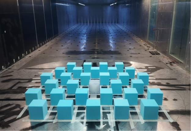 Photo of cubes within a wind tunnel