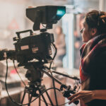 Female camera operator on film shoot