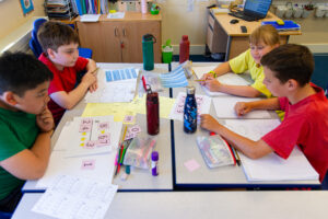 Four children working