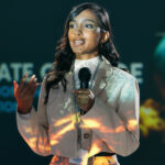 Business woman, seminar and talk for presentation, learning and climate change speech at conference. Female presenter, mic and talking for global warming forum, education and eco friendly convention.